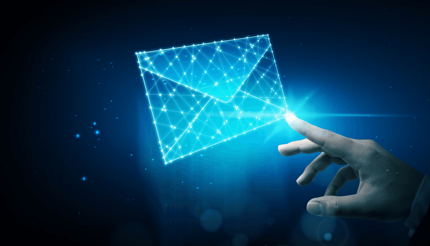 Photograph of the index finger of a man's hand connecting with a bright blue envelope over a night-sky background